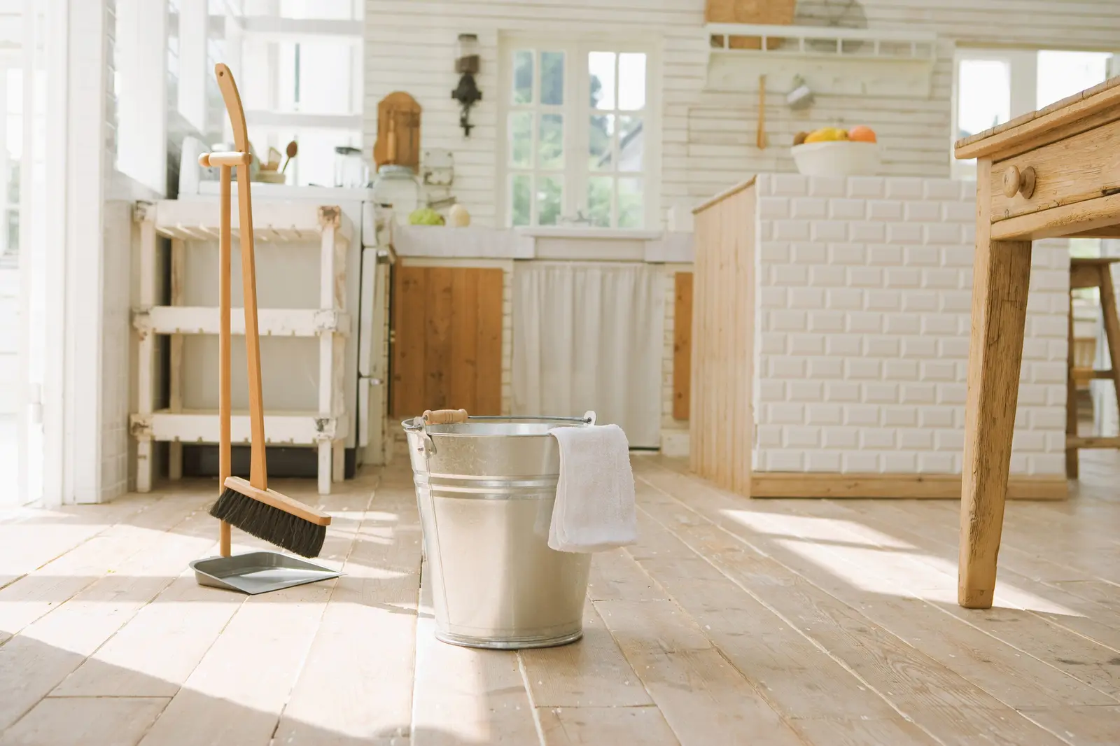 Cleaning tools ready in a bright, freshly cleaned room